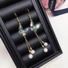 Elegant Freshwater Pearl Bracelet & Abalone Shell Butterfly Earring Set