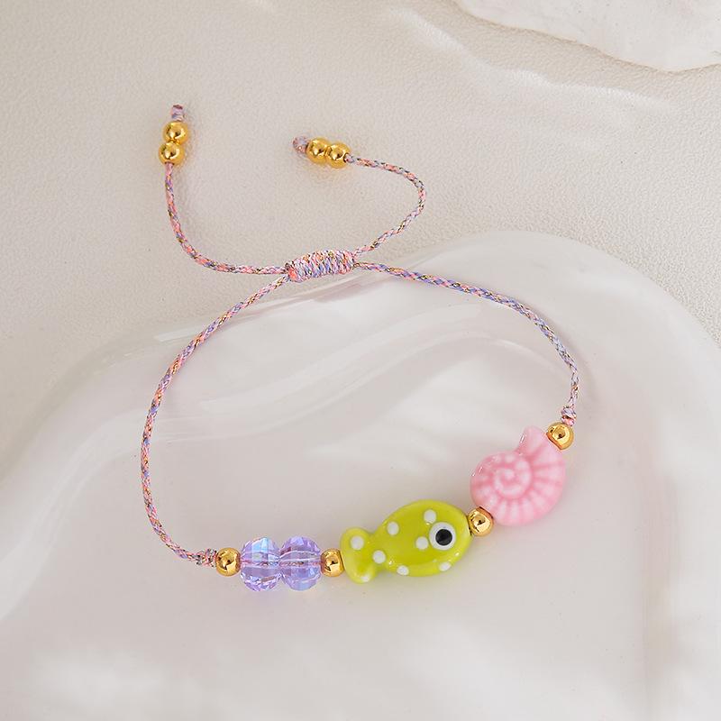 Bohemian Handmade Braided Rope Bracelet with Small Fish and Conch Charms