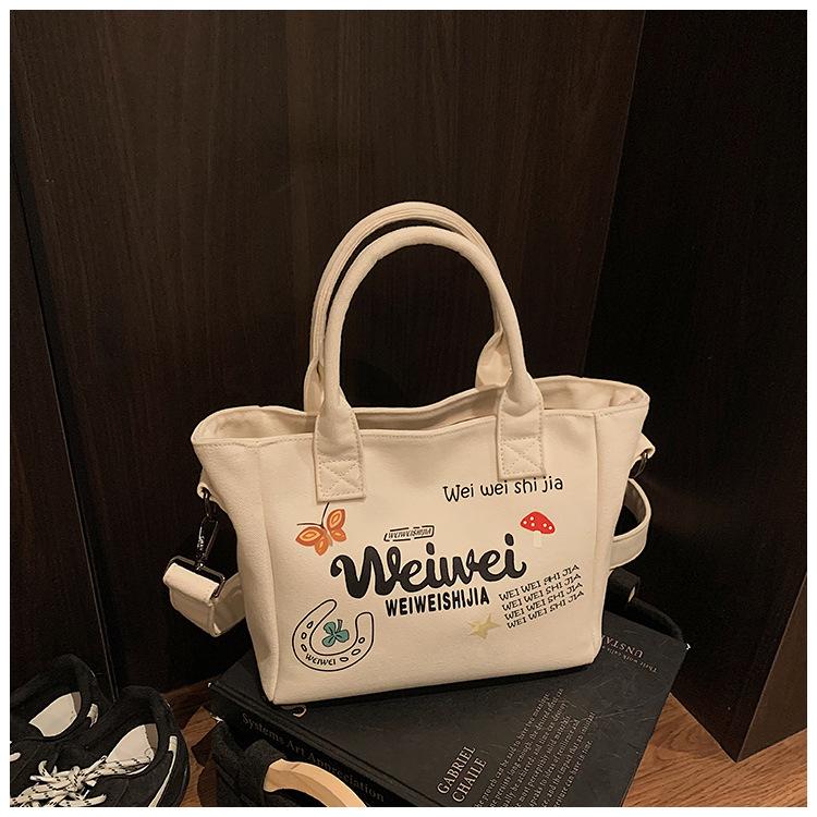 

New women s bag fashionable versatile large-capacity canvas tote crossbody shoulder portable shopping bag