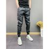 Men's Windproof & Waterproof PU Leather Pants - Trendy Korean Style, Six-Pocket, Cuffed, Solid Color Casual Trousers for Autumn & Winter.
