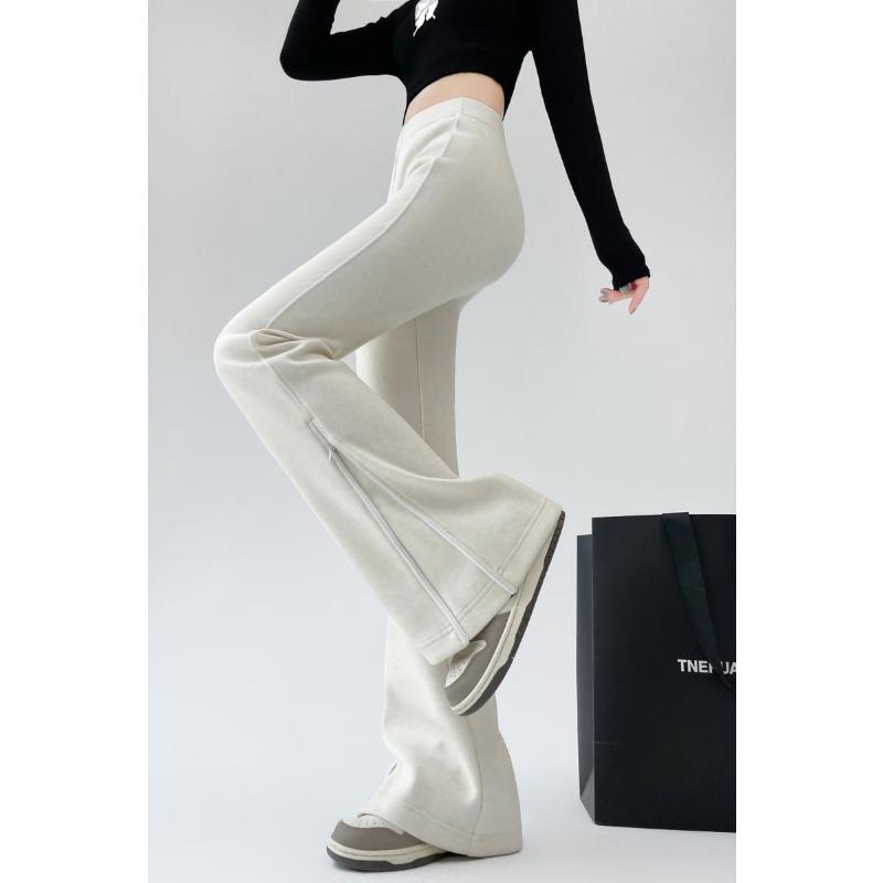 Jesienna Moda Damska Rozszerzane Długie Spodnie 2024 Nowe Elastyczne z Wysokim Stanem Casualowe Dopasowane Spodnie na Zamek Damskie Jednokolorowe Eleganckie Spodnie 2387