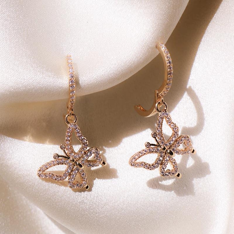 

2026 New European and American Creative Rose Gold Butterfly Women s Zircon Earrings for Personalized Banquet Accessories