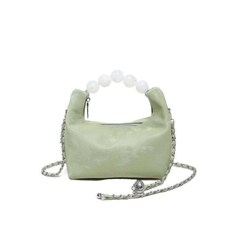 This year, the popular small bag women's 2025 spring new textured chain messenger bag premium pearl bucket dumpling bag