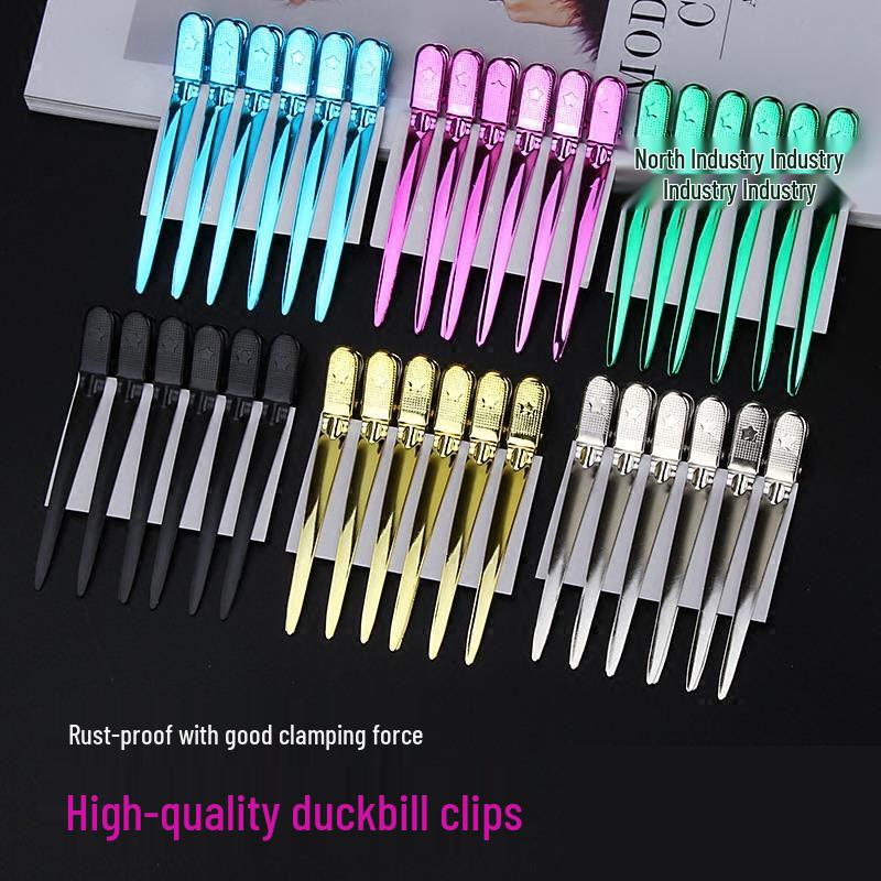 

Затискач Качка для позиціонування при хвилюванні та фарбуванні волосся