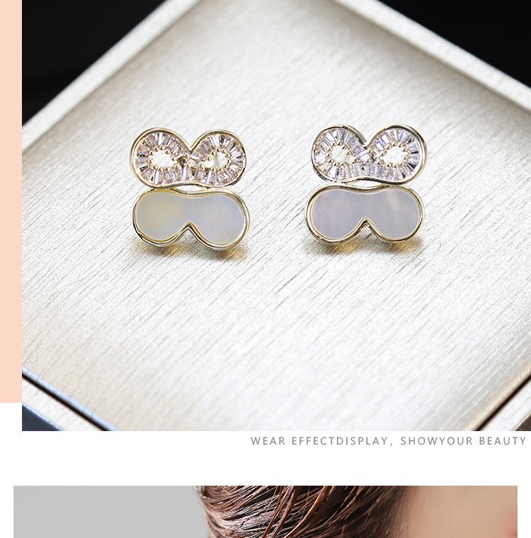 Elegant Four-Leaf Zircon Flower Earrings – Luxurious and Versatile Design for Women