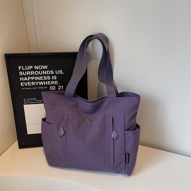 Large-capacity solid color women's bag winter new simple outdoor bag commuter high-value shoulder bag