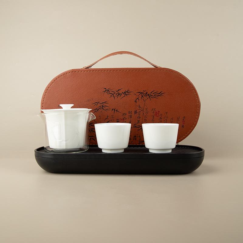 Sheep Fat Jade Portable Ceramic Tea Set - One Pot, Two Cups, Travel-Friendly Souvenir.