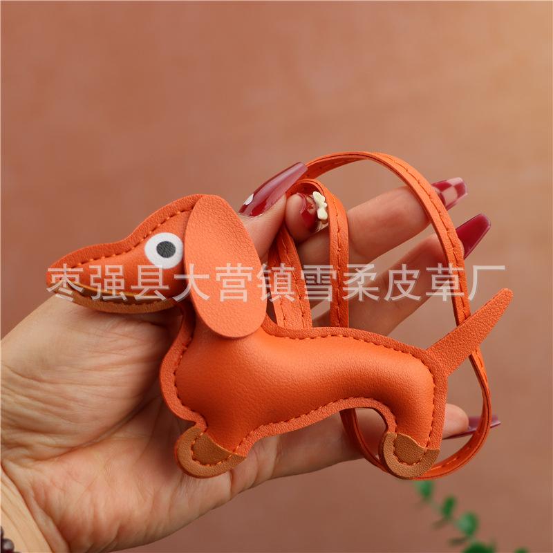 

Creative Dachshund Bag Pendant Decorative Leather Pendant Cartoon Leather Rope Puppy Key Accessories Pendant помаранчевий