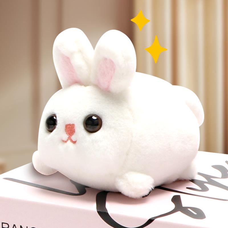 

Плюшевый котенок с машущим хвостом на шнурке и вращающейся мультяшной куклой-рюкзаком в виде кролика в подарок 10cm