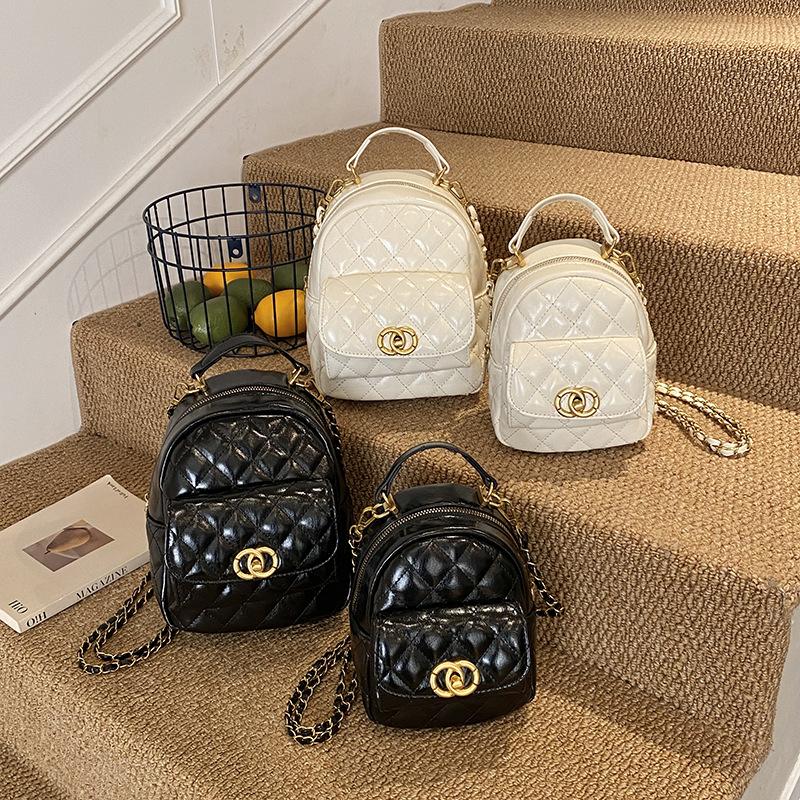 Rauten-Ketten-Rucksack Damenmode Nischendesign Lässig Koreanische Version Studenten-Einkaufs-Leichtgewicht Mini-Reiserucksack