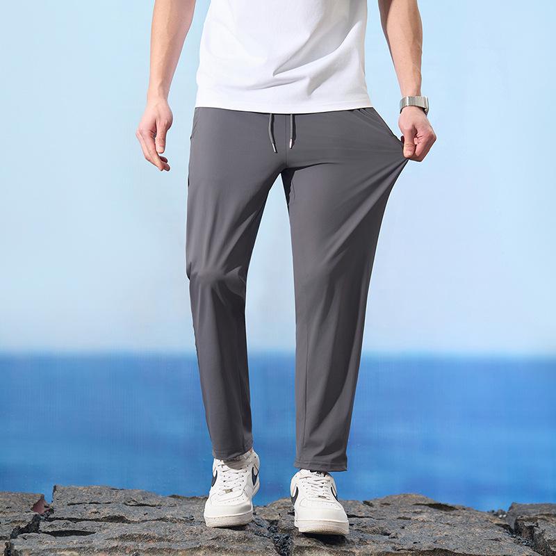 

Летние быстросохнущие спортивные штаны из ледяного шелка с манжетами для мужчин и женщин - Высокая эластичность, Прямой крой, Свободная посадка 4XL