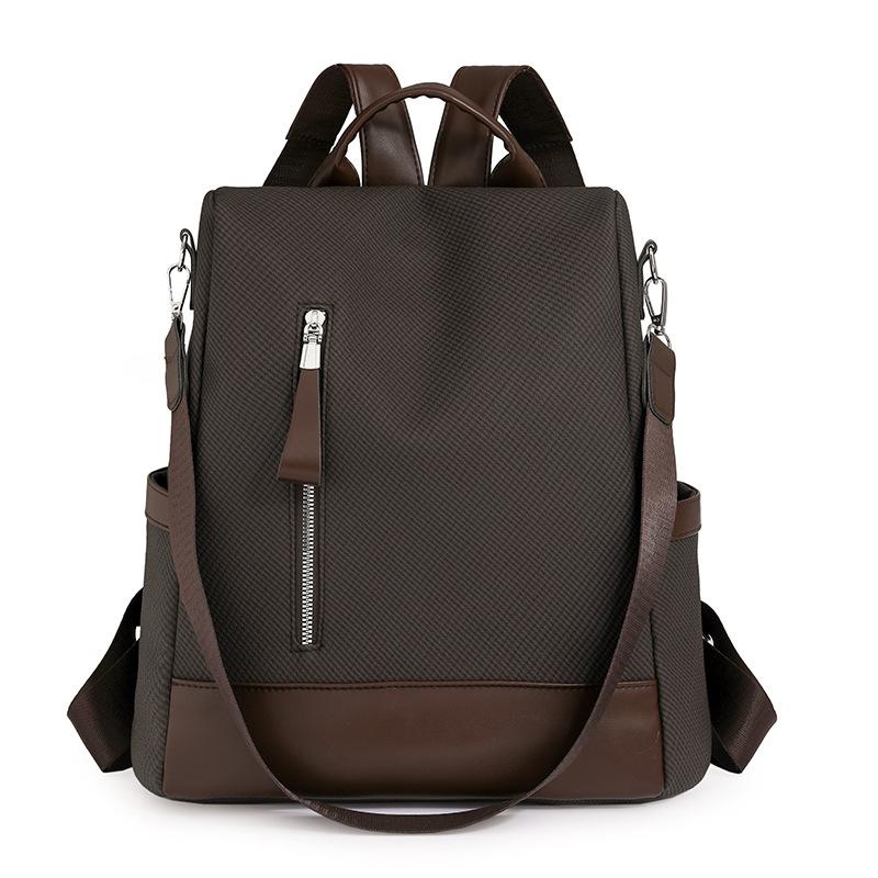 Schoolbag backpack women pu fabric texture commuting large capacity waterproof travel anti-theft backpack niche retro Baigou bag