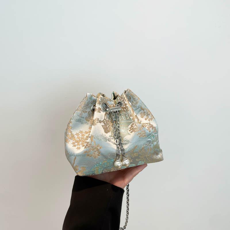 

New Chinese style national style women s bag handbag 2025 new bucket small bag simple chain single shoulder oblique span bag зелёный