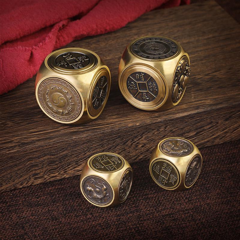 Four Divine Beasts Rotating Coin: Yellow Brass Qiankun Wealth-Attracting Copper Decompression Cube Handheld Craft.