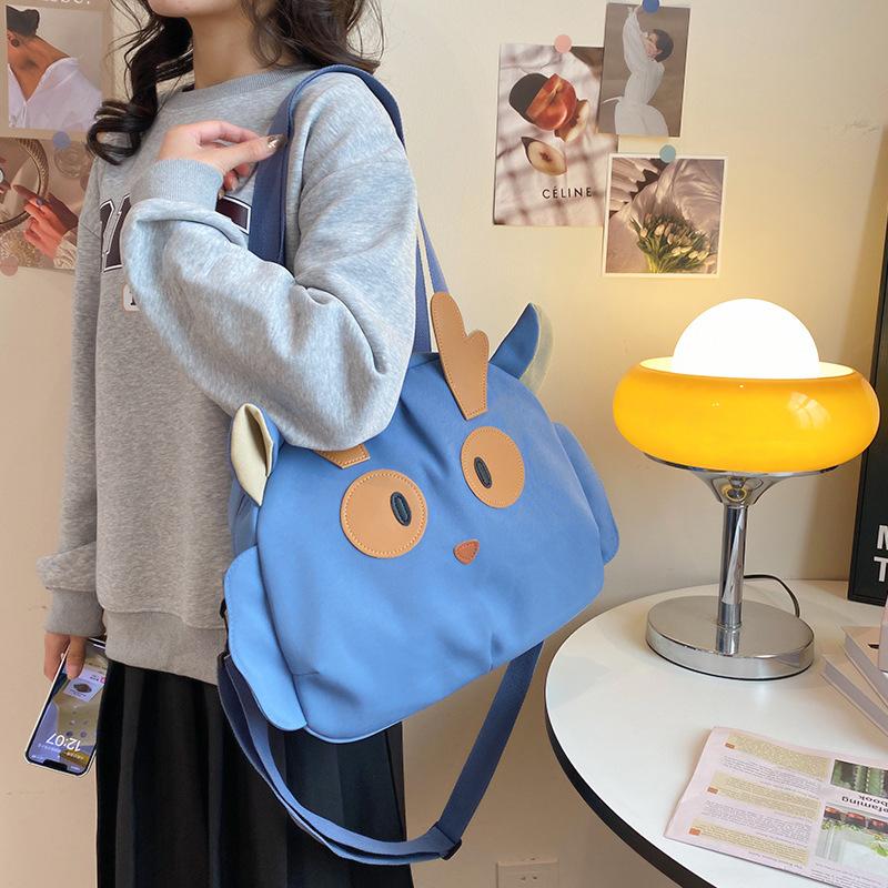 bag shoulder bag cartoon messenger bag middle school student casual canvas large capacity schoolbag cute wind commuter bag