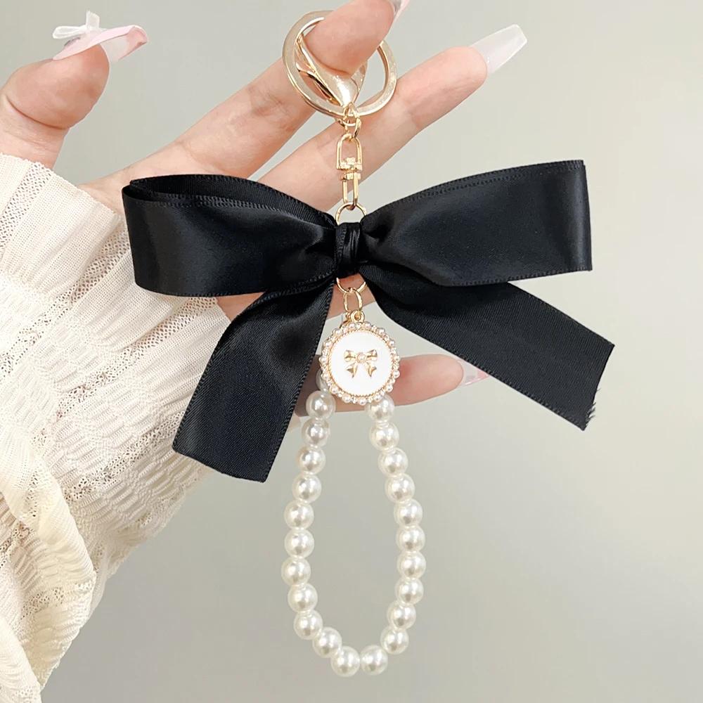 

2026 New Fashion Imitation Pearl Keychain Sweet Ribbon Bowknot Keyring Accessories Metal Buckle Women Bag Bow Best Gifts Jewelry чорний