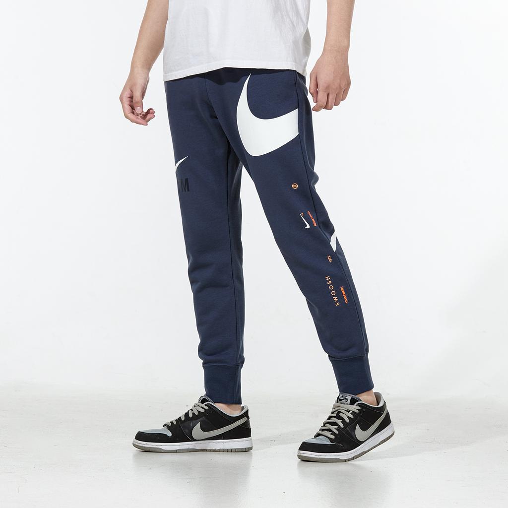 Nike Pánské pletené joggery se stahovací šňůrkou s velkým logem Swoosh Modré DD6092-437