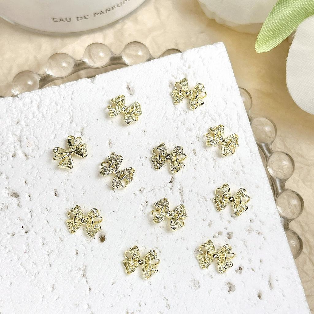 Acessórios para Nail Art Liga Mini Laço Fita Dourada Liga K Branca Decoração de Unha Simples Gravata Borboleta 3D