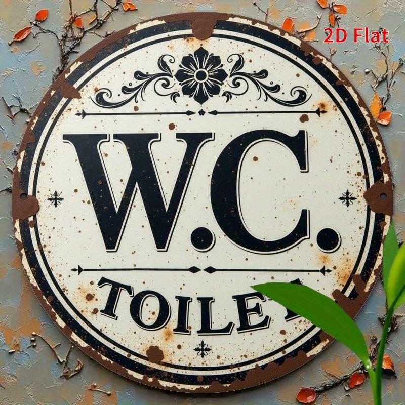 

Vintage WC Toilet Sign. Round aluminum plaque with floral design for farmhouse or cafe. чистый