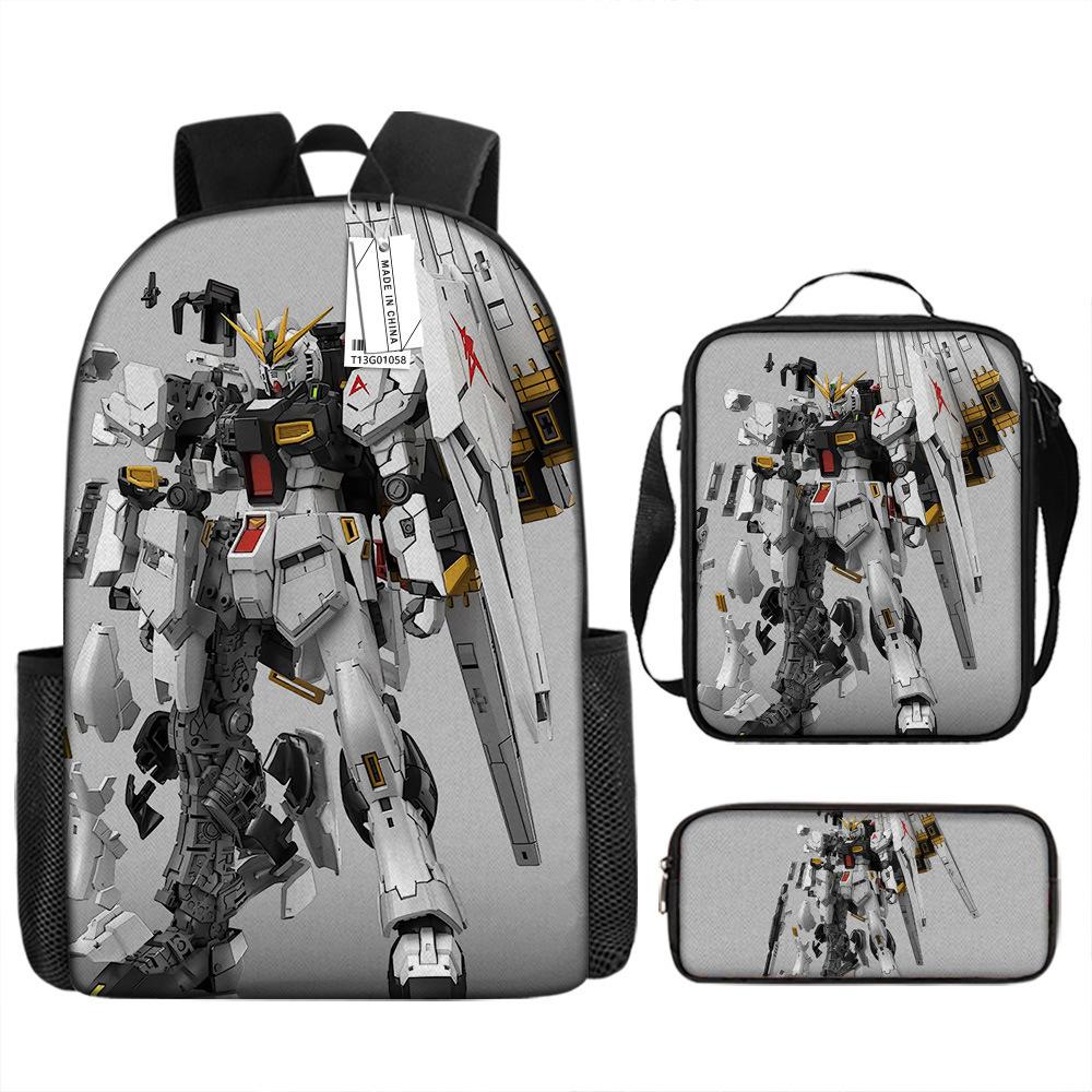 Gundam Mecha Schultasche Jungen und Grundschüler Ultraleichter Rückenschutz Rucksack Jungen Animation Kinderrucksack Dreiteiliges Set