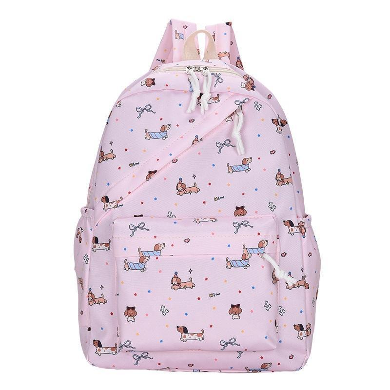 New cartoon printed women's schoolbag, junior high school and primary school students reduce the burden of three-piece backpack, large-capacity