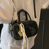 Early spring new fashion graffiti embossed matte texture portable pillow bag versatile Korean version casual commuter messenger bag