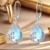 S925 Silber Mondstein Wellenförmiger Tropfen Anhänger Ohrringe Europäische und Amerikanische Damenohrringe Natürlicher Tropfen Hochwertige Ohrringe