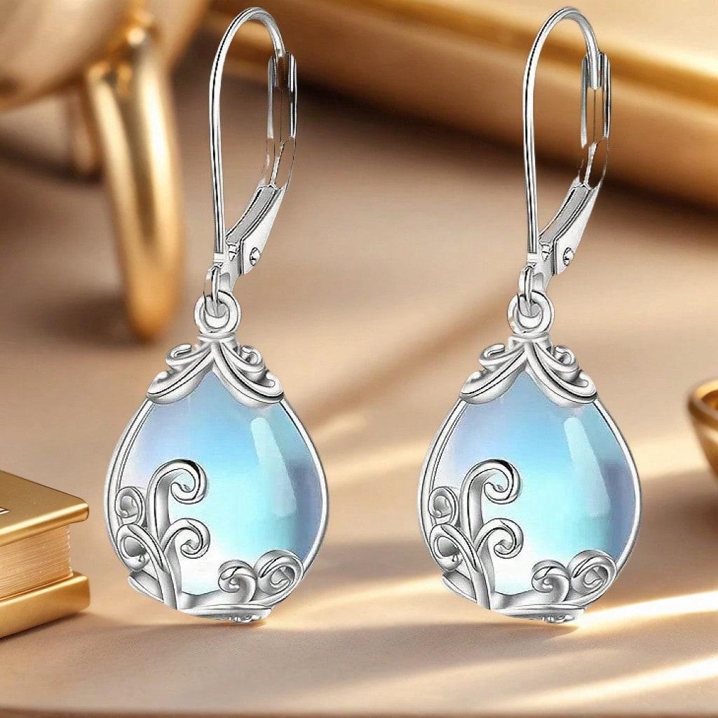 S925 Silber Mondstein Wellenförmiger Tropfen Anhänger Ohrringe Europäische und Amerikanische Damenohrringe Natürlicher Tropfen Hochwertige Ohrringe