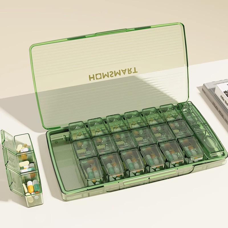 

Коробка для распределения лекарств на 1-7 дней - оснащена 7 штуками коробок для лекарств с 21 ячейкой и таблетницей зелёный