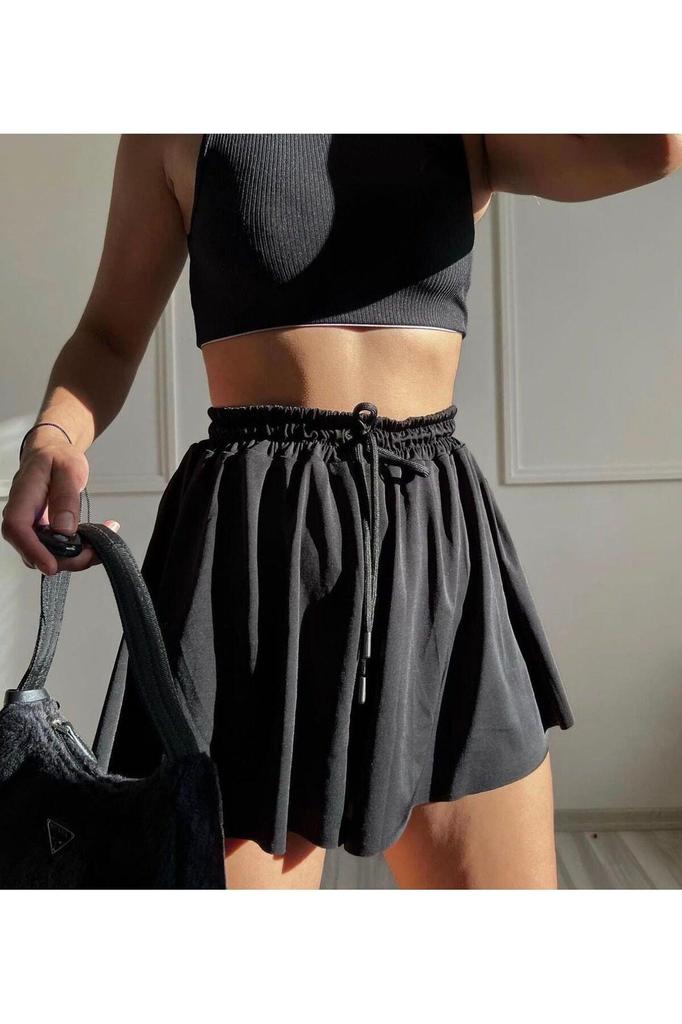 Medias de corte holgado para mujer Falda corta deportiva Negro