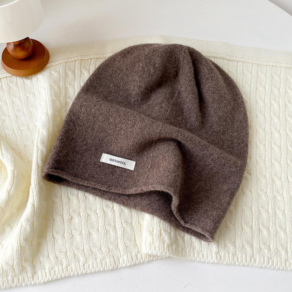 Solid color wool knitted stacking hat women's autumn and winter 0% all-wool knitted hat fashionable versatile cold hat ear protection hat