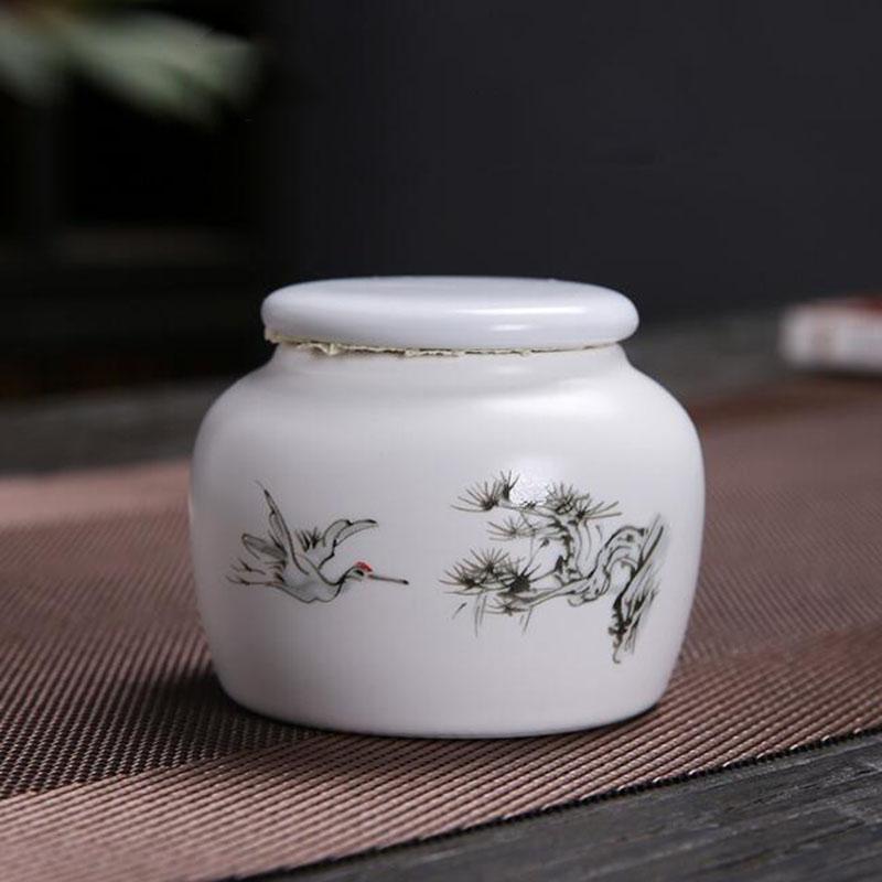 Porcelain White Color Chinese Style Lotus Pattern Sealed Storage Tea Jar Travel Easy to Carry Power Spice Tea Box Teaware