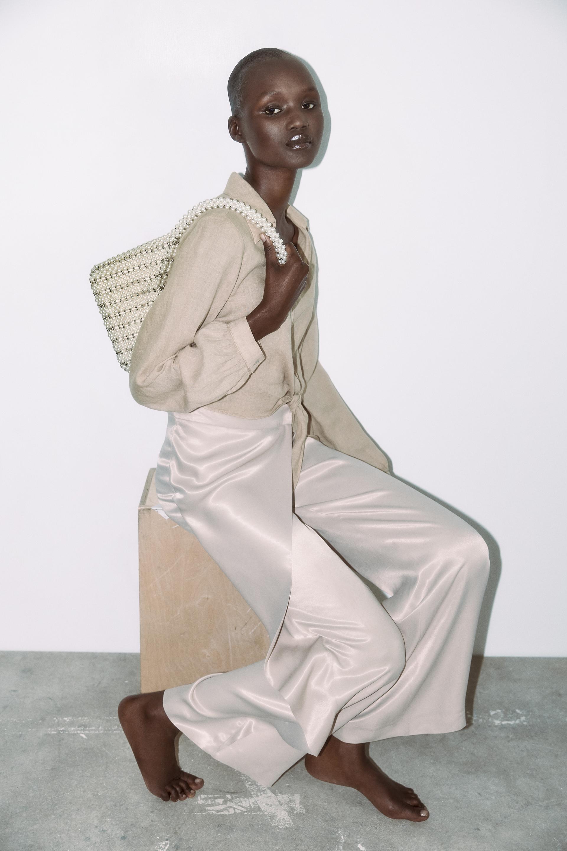 

СУМКА-ВЕДРО С ИСКУССТВЕННЫМ ЖЕМЧУГОМ