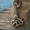 Porte-clés Pendentif Design Poulpe Multi-Tentaculaire Charme Océanique Chaîne de Clés en Alliage Taille Compacte Accessoire Sac à Dos