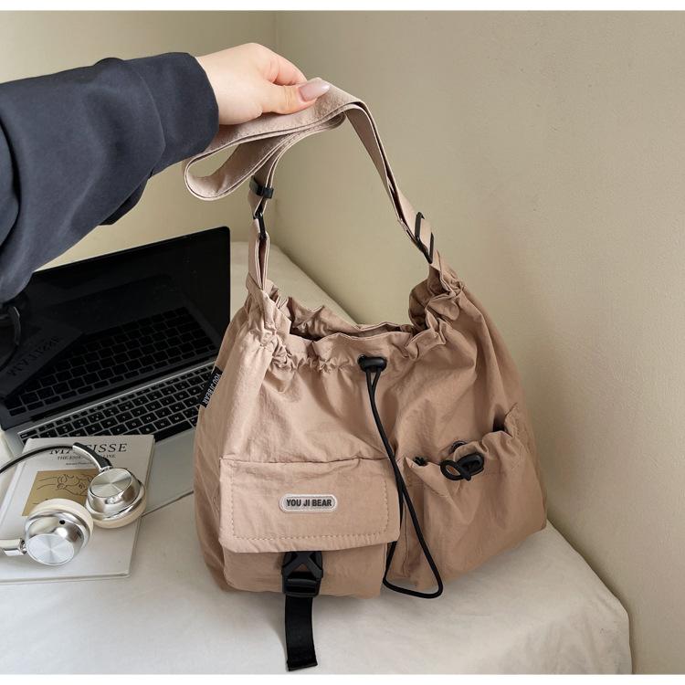 

Летняя нейлоновая сумка-мессенджер 2025, универсальная сумка-ведро на шнурке, легкая повседневная ветровка, большая вместительная наплечная сумка для женщин хаки