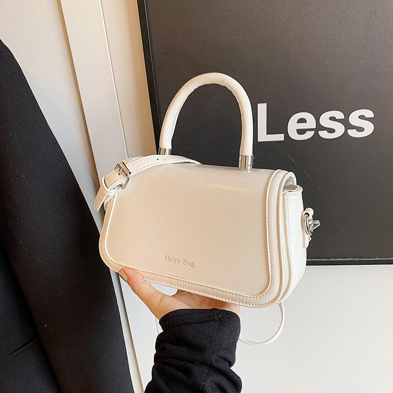 

Елітна сумочка модна жіноча сумка на одне плече через плече під пахвами в іноземному стилі універсальна жіноча корейська версія ніша маленька квадратна сумка білий