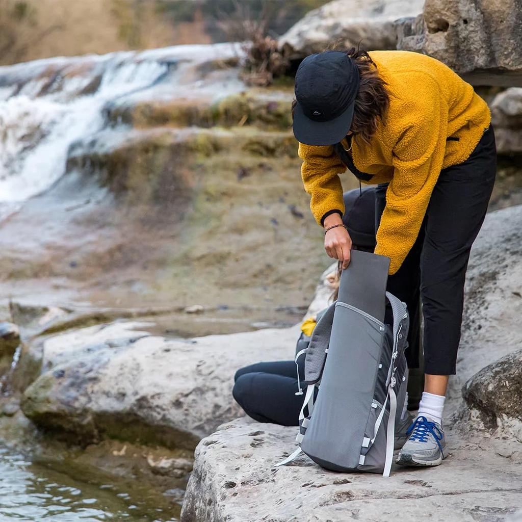 Gossamer Gear Minimalist 19 Daypack in Grey. Ultralight 19L backpack for commuting, hiking, and everyday use. Foldable for compact storage.