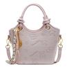 2025 new niche embossed fashion personalized portable bucket bag high-end commuter versatile women's messenger bag