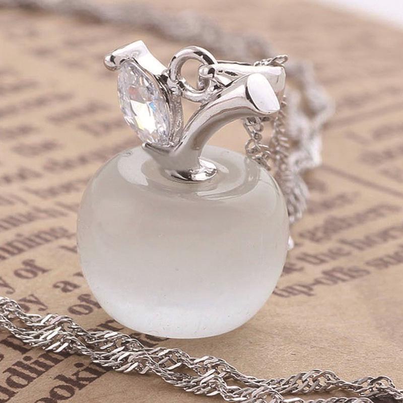 Apple Cat's Eye Stone Necklace with Rose Quartz, Silver, and Moonstone Pendants