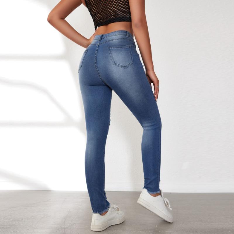 Spring new ripped leopard print patch slim and thin mid-waist washed small feet jeans women