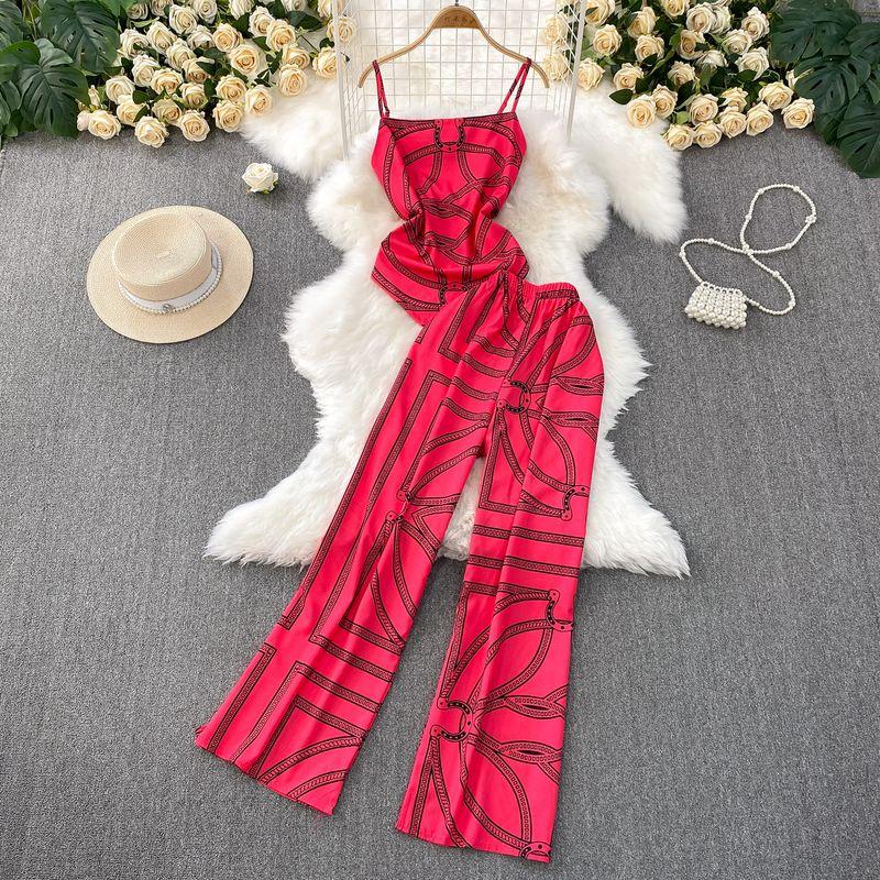 

2025 Новая Мода для Отпуска Принт Необычный Топ на Бретелях + Свободные Стройнящие Брюки Палаццо Комплект Высокого Качества Pink One size