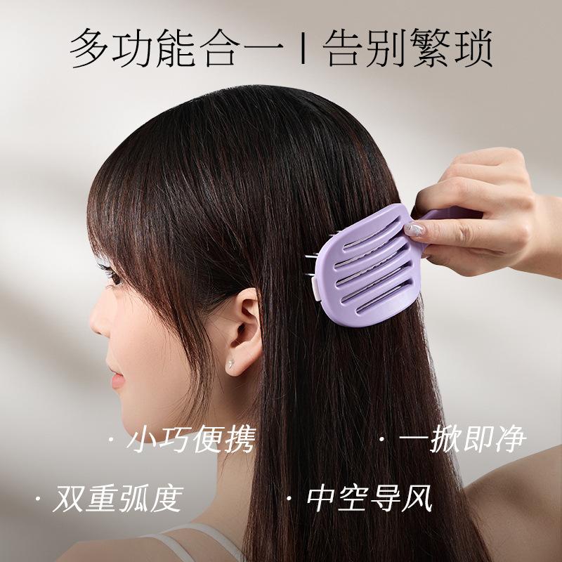The new fluffy high cranial top comb comes with its own clean and removable massage airbag air cushion comb folding ribs comb.
