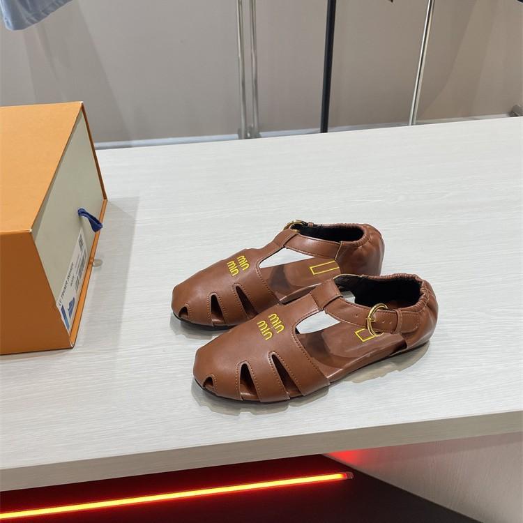 Baotou Roman sandals women's high new retro hollow versatile leather flat-bottomed casual pig cage shoes