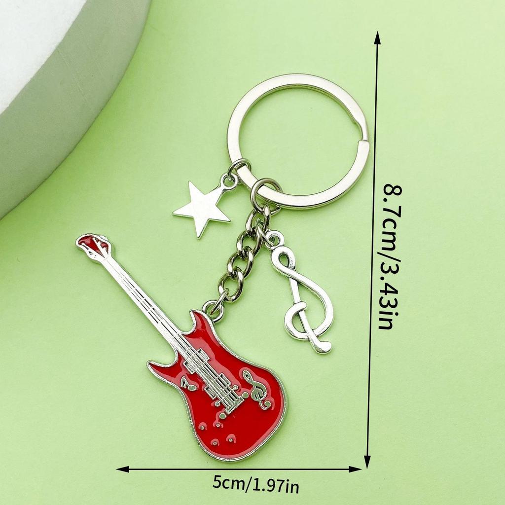 Antique Silver Music Cassette & Saxophone Keychain with Creative Design