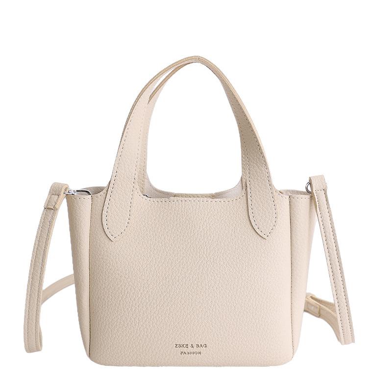 Advanced Handheld Bucket Bag Women 2026 New Retro Lychee Pattern Mother Child Versatile Simple Single Shoulder Crossbody