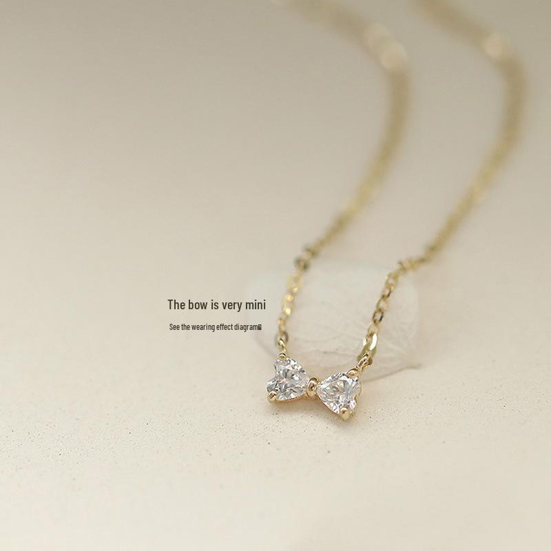 Hot Sale S925 Sterling Silver Bow Necklace with 14k Gold Heart-Shaped Pendant - Light Luxury Ins Style.