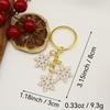European & American Cross-border Christmas Snowflake Alloy Keychain with Bell Pendant - Creative Holiday Gift