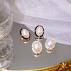 Silver Needle French Oval Pearl Stud Earrings - Classic Luxury Court Style with Geometric Design and Bold Personality.