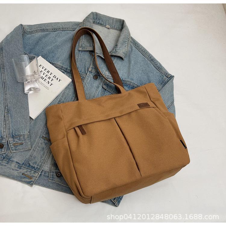 

Outer single casual cloth bag women s 2025 new versatile college student class bag large-capacity commuting shoulder tote bag коричневый