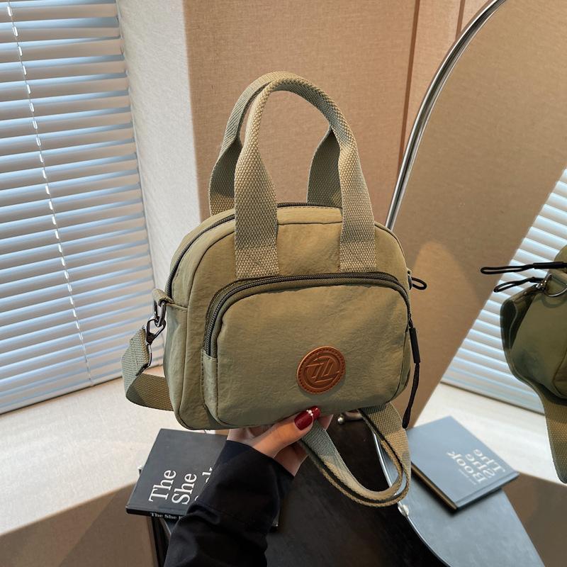 

2025 portable small bag spring and summer shoulder messenger bag women s bag fashion cloth bag hand bag casual small square bag зелений